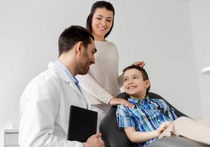 How Pediatric Dentists Work With Parents To Build Positive Habits